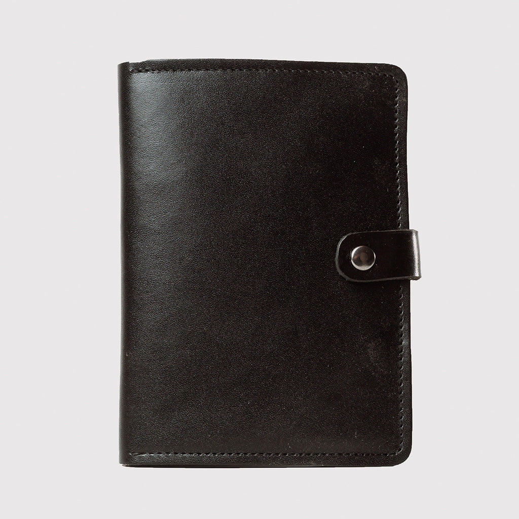 PORTAPASAPORTE NEGRO