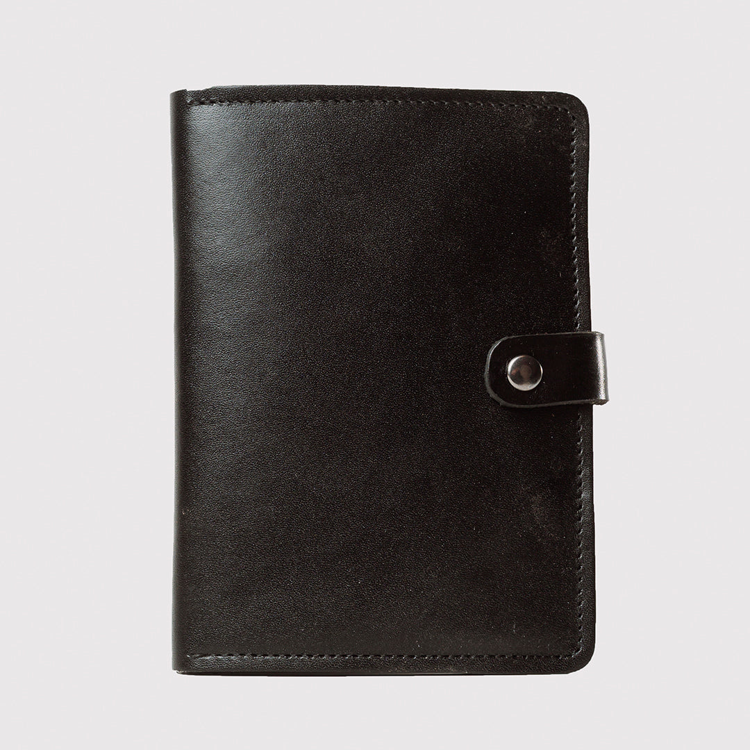 PORTAPASAPORTE NEGRO